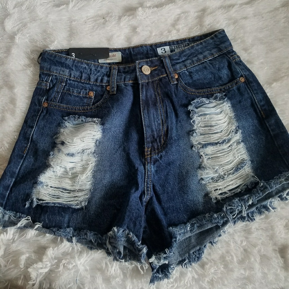 Distressed dark wash jean shorts